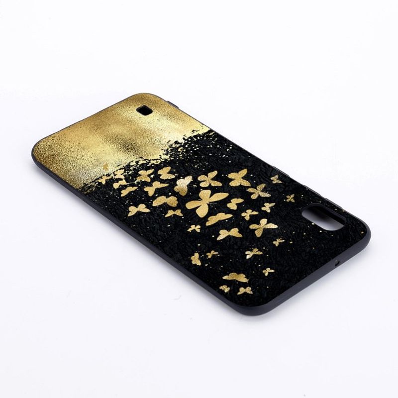 Samsung Galaxy A10 - Coque papillons dorés