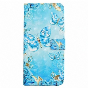 Housse iPhone 16 Pro Papillons Bleus